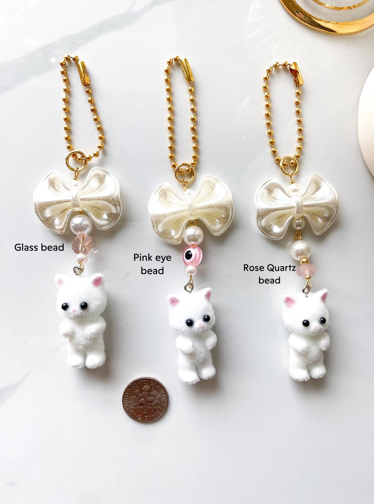 a close up of four different key chains