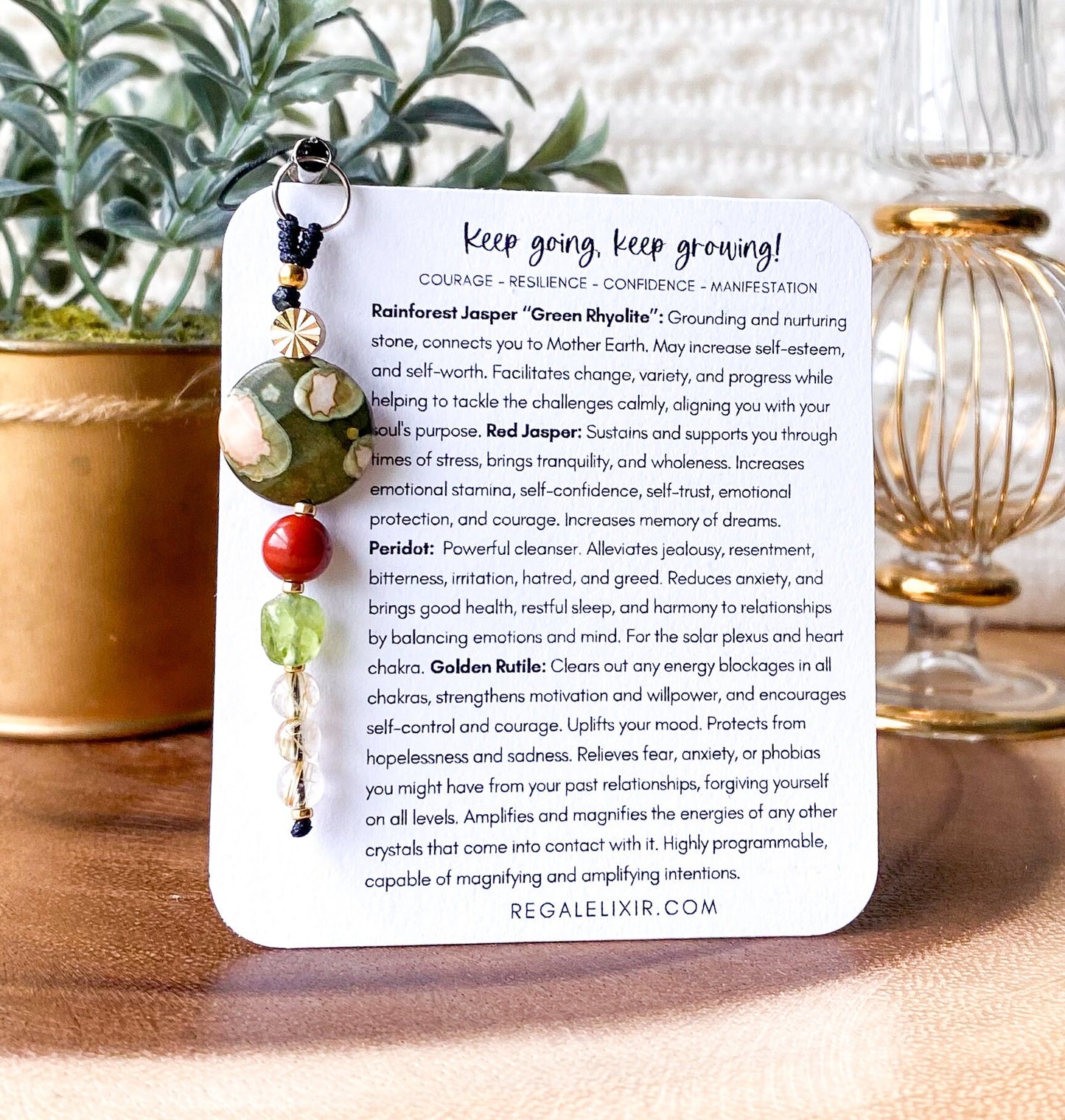 a card with a keychain hanging from it's side