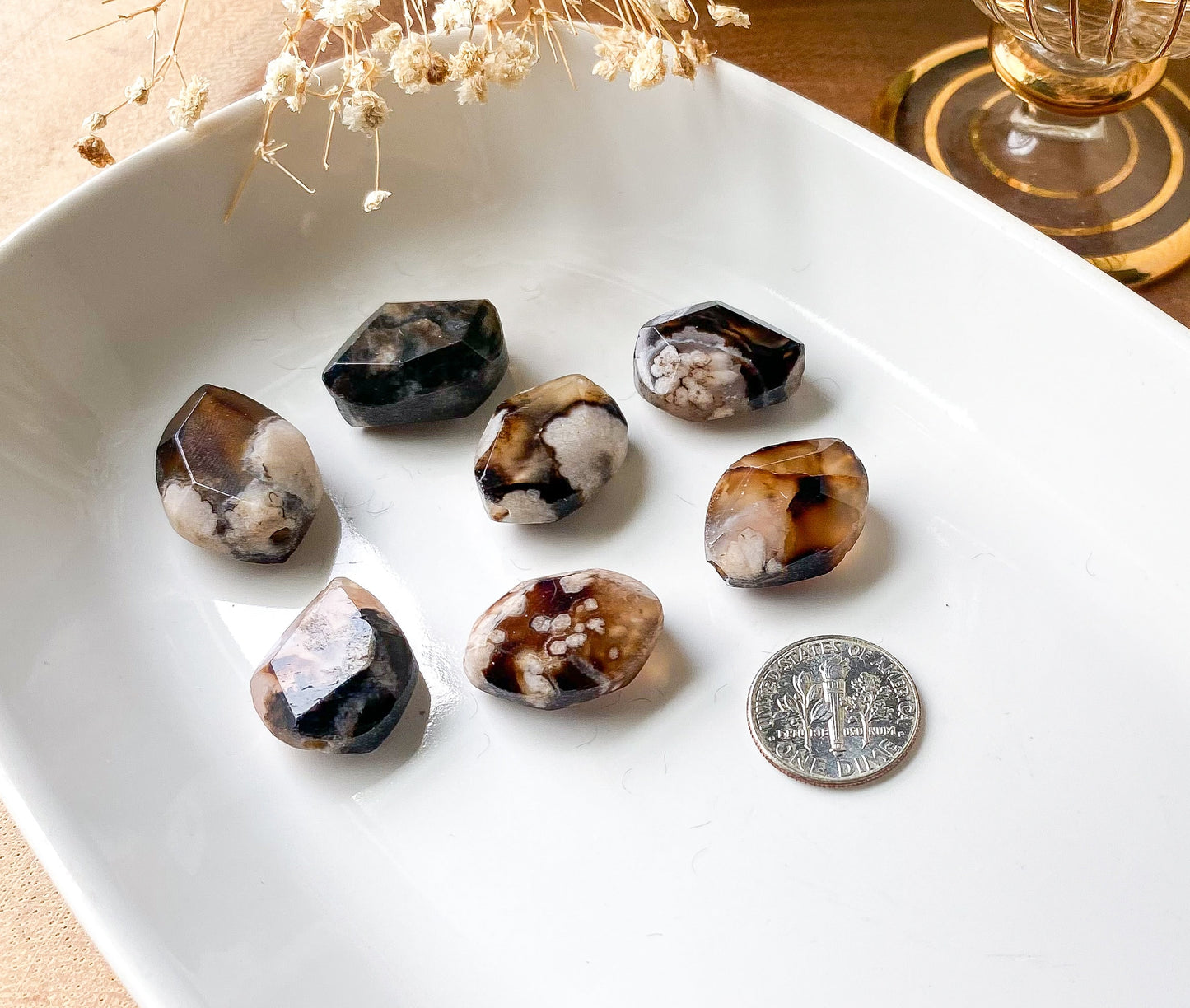 a bunch of rocks sitting on top of a white plate