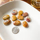 a bunch of rocks sitting on top of a white plate
