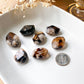 a bunch of rocks sitting on top of a white plate