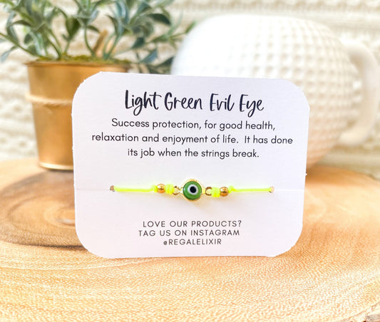 Neon green gold filled evil eye bracelet